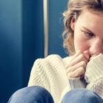 Young girl feeling alone during a mental health crisis for teens