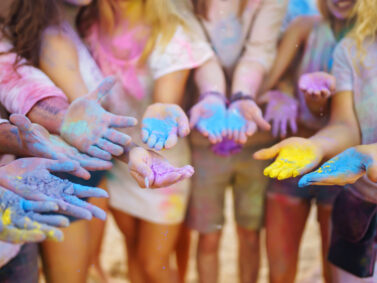 Friends having fun at the Holi Festival of Colors