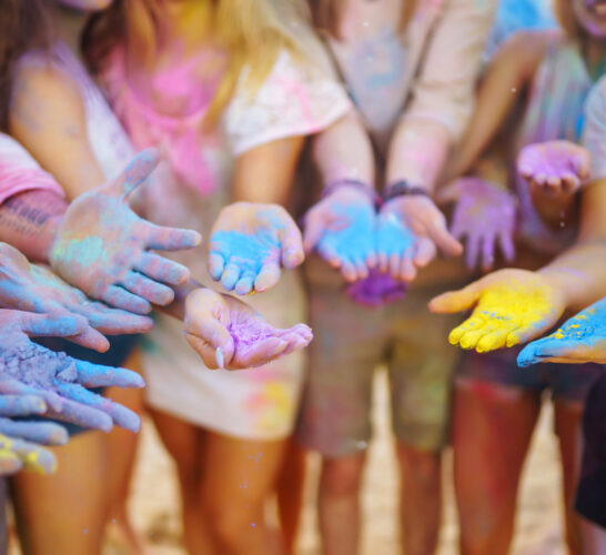 Friends having fun at the Holi Festival of Colors